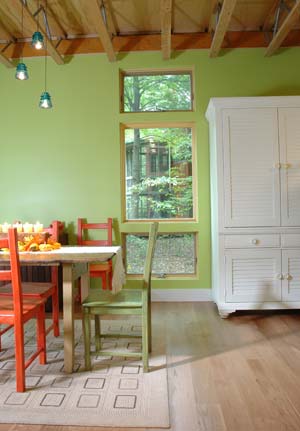 Tryon Farm offers a variety of home designs. This cheery dining room is in one of the 'C' cottages in the woods.